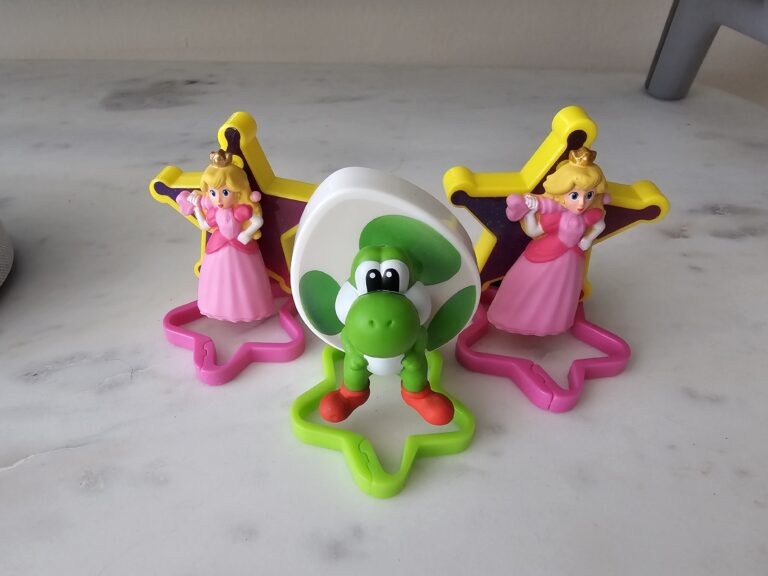 three McDonald's Happy Meal toys placed together